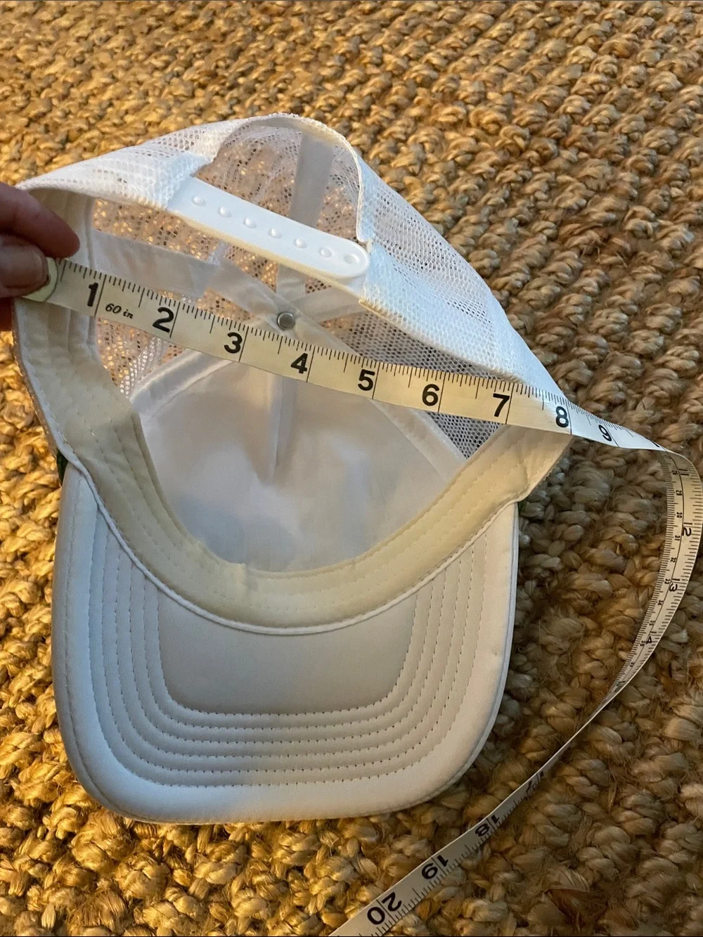 White Trucker Hat with Green Script Accent